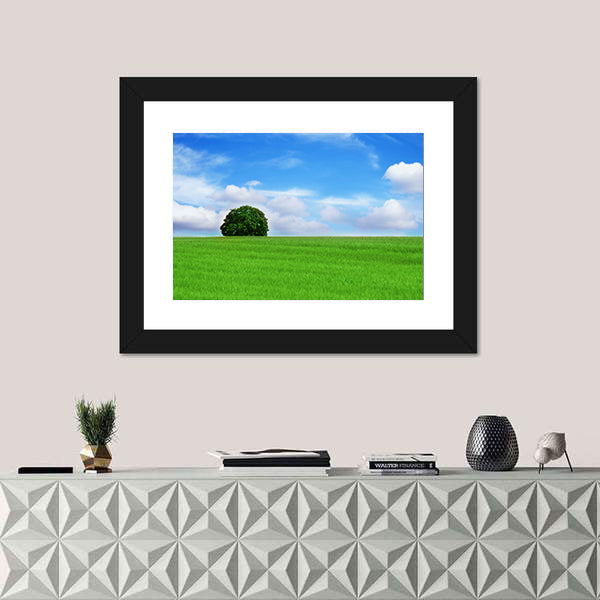 Lone Tree in Vibrant Green Field Canvas Wall Art