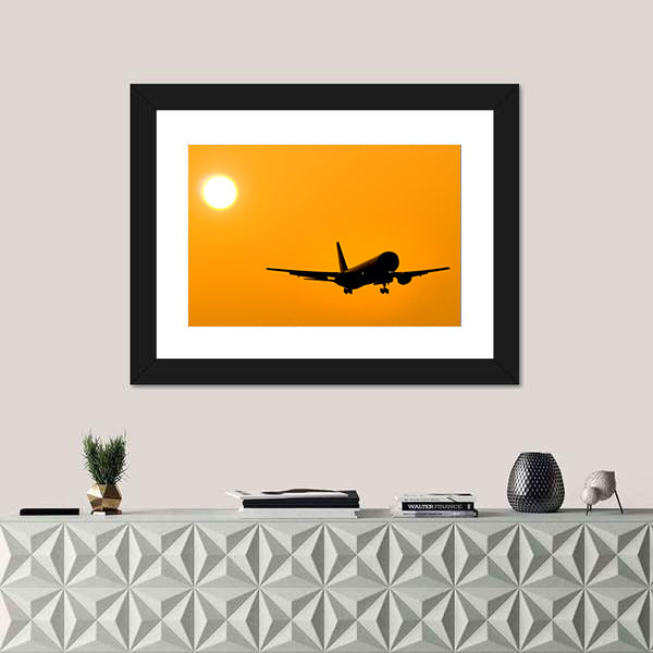 Aircraft Landing At Sunset Canvas Wall Art