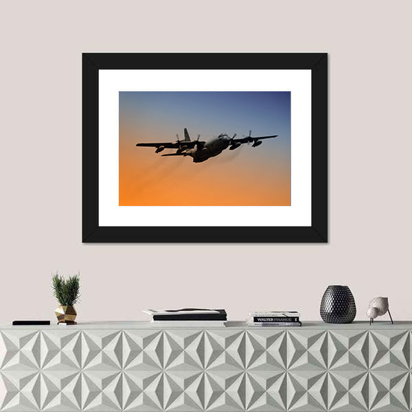 Military Airplane Flying Into Early Morning Sky Canvas Wall Art