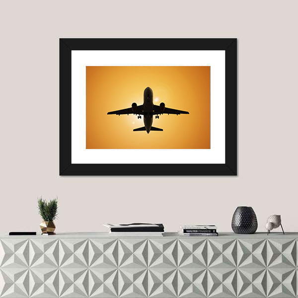 Airplane Silhouette Against the Sun Canvas Wall Art