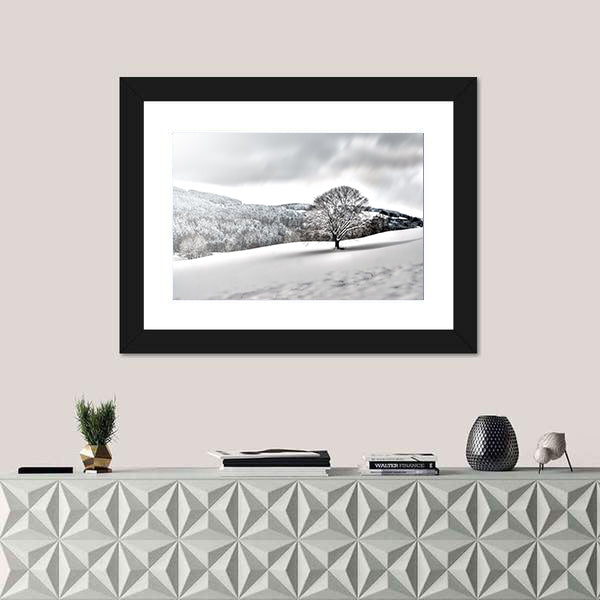 Lonely Tree In Snowy Landscape Canvas Wall Art