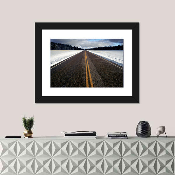 Straight Strip Of Road In Winter Canvas Wall Art