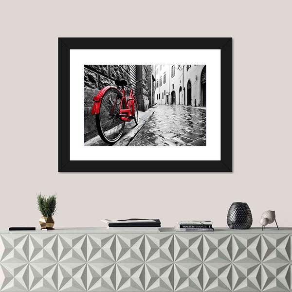 Red Bicycle on Cobblestone Street Canvas Wall Art