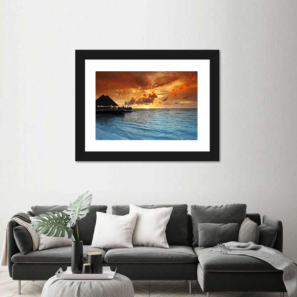 Maldives Thatched Hut on Pier at Sunset Canvas Wall Art