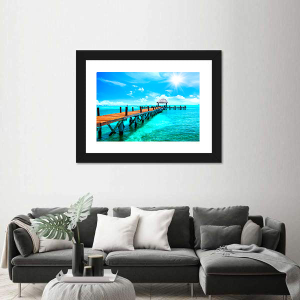 Sunlit Wooden Pier and Thatched Hut Canvas Wall Art