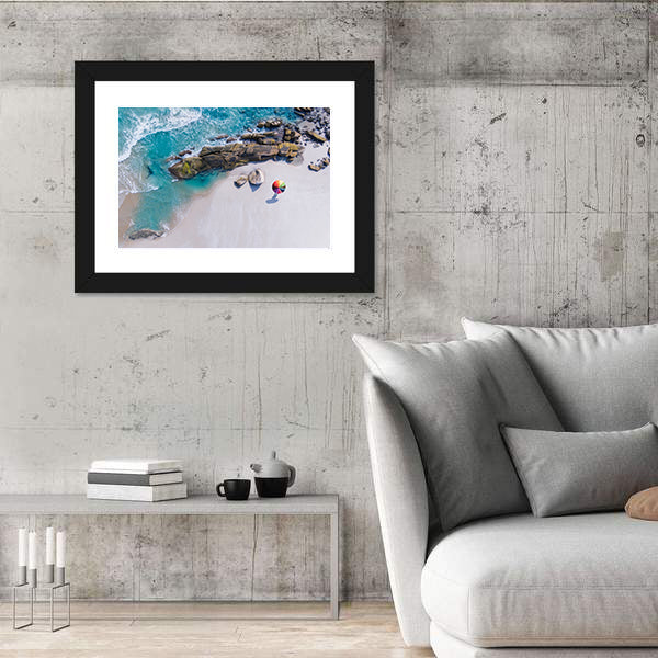 Umbrella On The Beach And Foam Of Sea Wave Canvas Wall Art