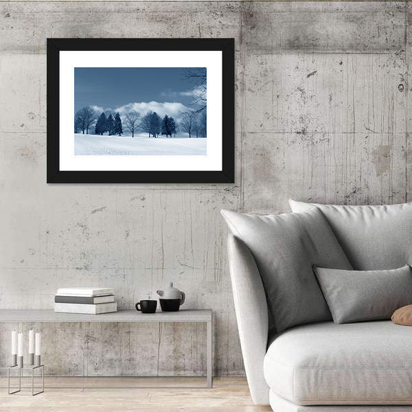 Snowy Field with Evergreens and Tracks Canvas Wall Art