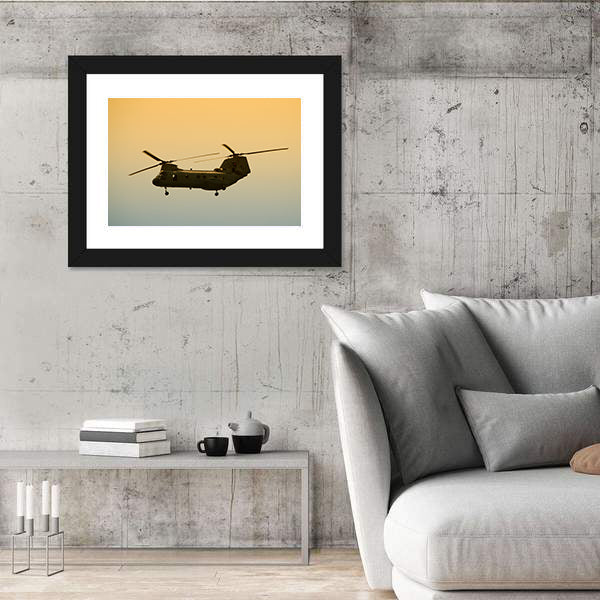Military Cargo Helicopter In Flight At Dawn Canvas Wall Art