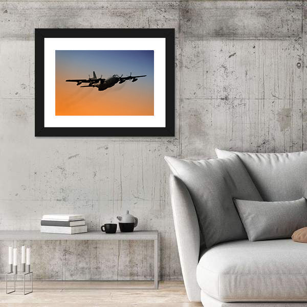 Military Airplane Flying Into Early Morning Sky Canvas Wall Art