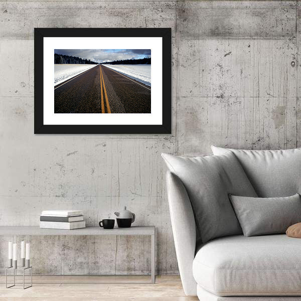 Straight Strip Of Road In Winter Canvas Wall Art