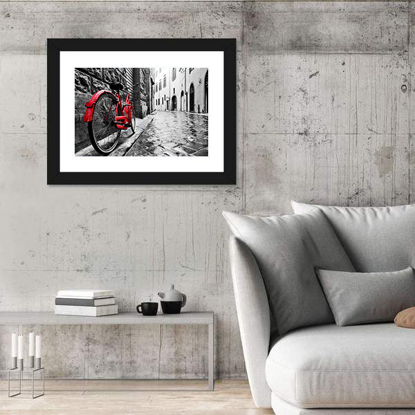 Red Bicycle on Cobblestone Street Canvas Wall Art