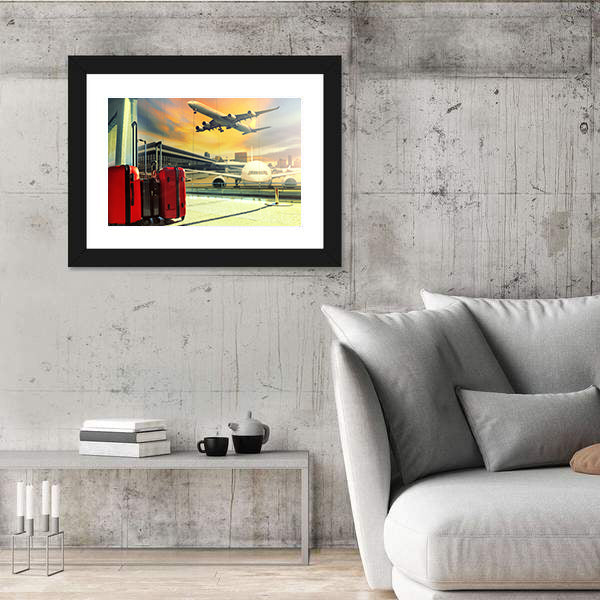 Red Suitcases and Plane at Sunset Canvas Wall Art