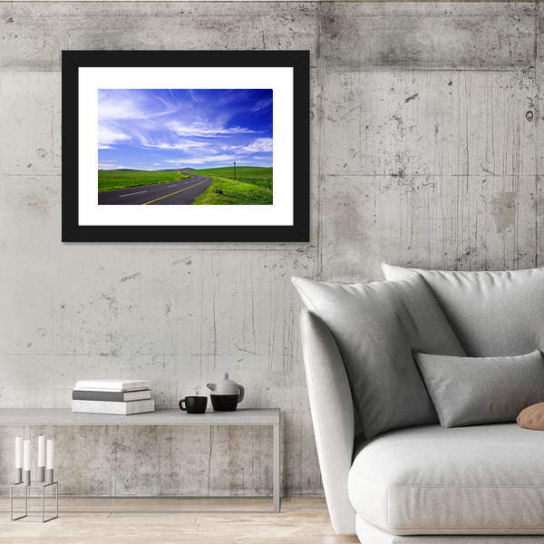 Winding Road Through Green Fields Canvas Wall Art