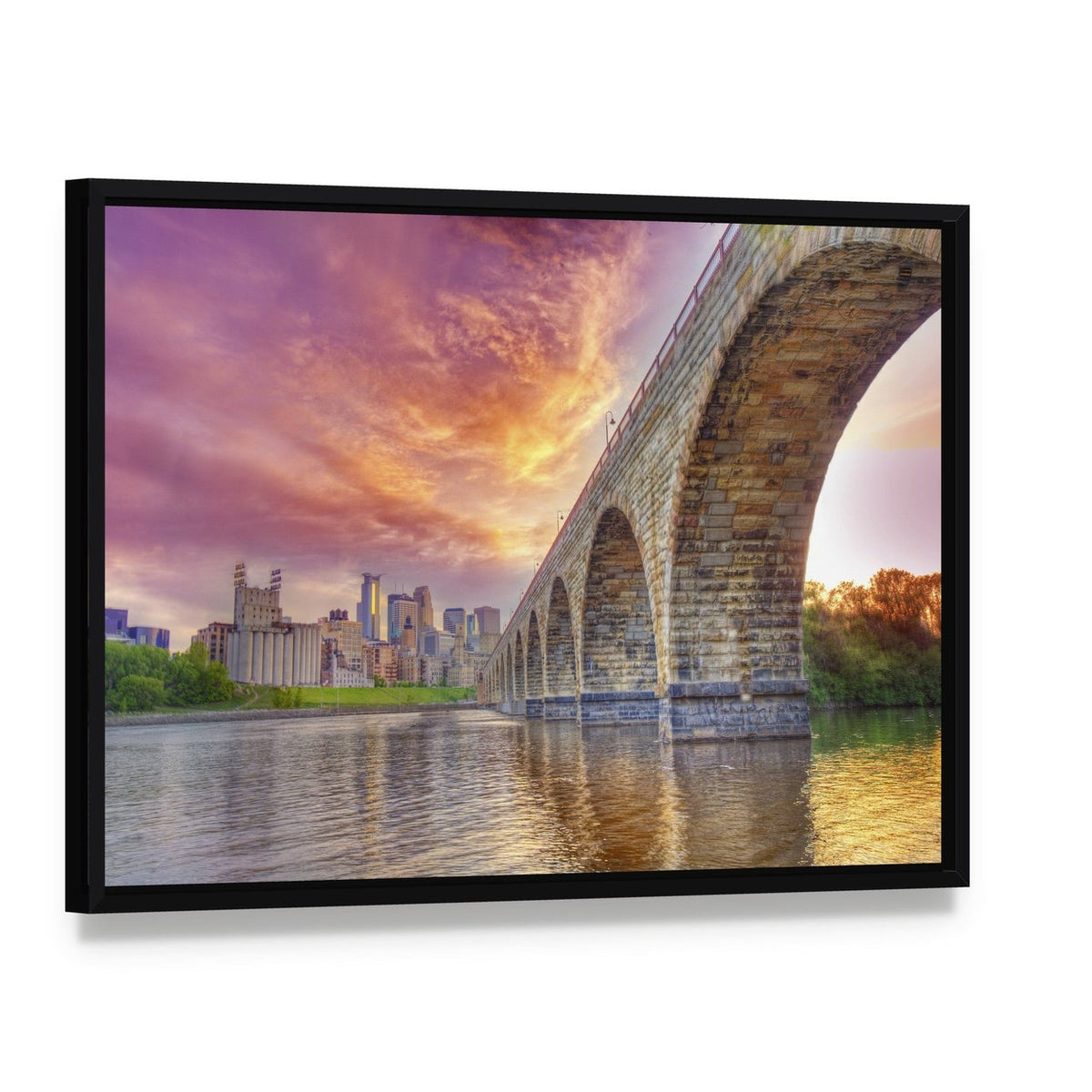 Minneapolis Arch Bridge at Sunset Canvas Wall Art, framed canvas in a black floater frame, angled product view