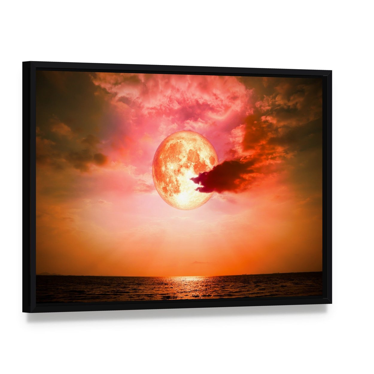 Full Blood Moon Over Ocean Canvas Wall Art, framed canvas in a black floater frame, angled product view
