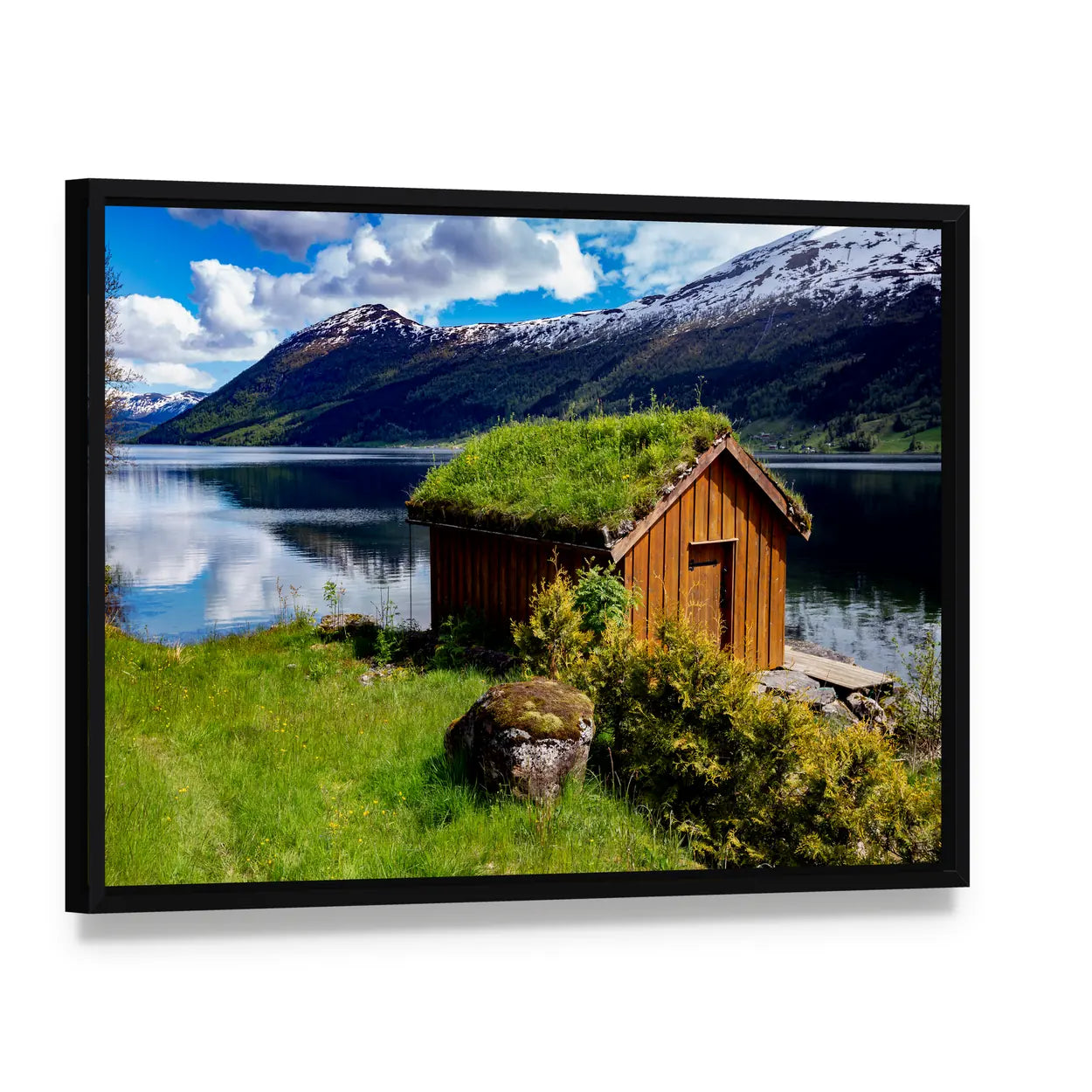 Norwegian Lakeside Hut with Sod Roof Canvas Wall Art, framed canvas in a black floater frame, angled product view