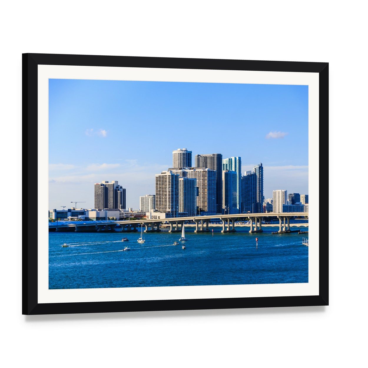 Miami Skyline Causeway View Canvas Wall Art, framed print with white mat and black frame, angled product view