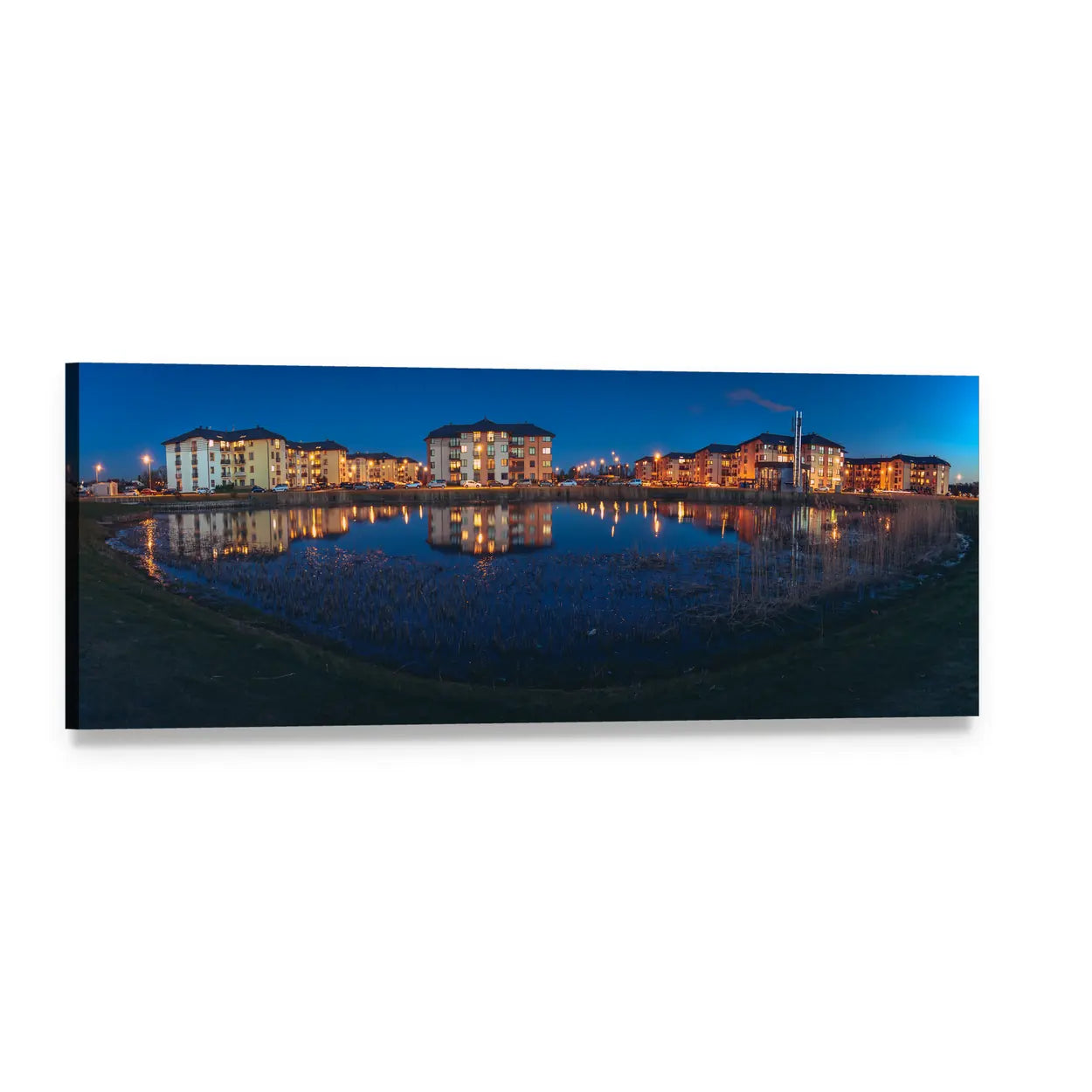 Modern Apartment Buildings at Night with Lake Reflection Panoramic Canvas Wall Art, single panel gallery wrapped canvas, angled product view
