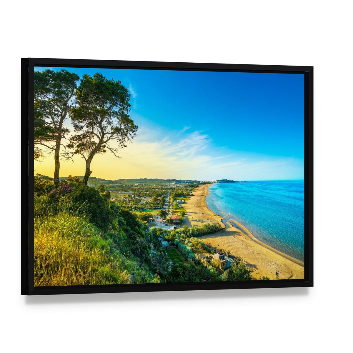 Clifftop Beach with Two Trees at Sunset Canvas Wall Art, framed canvas in a black floater frame, angled product view