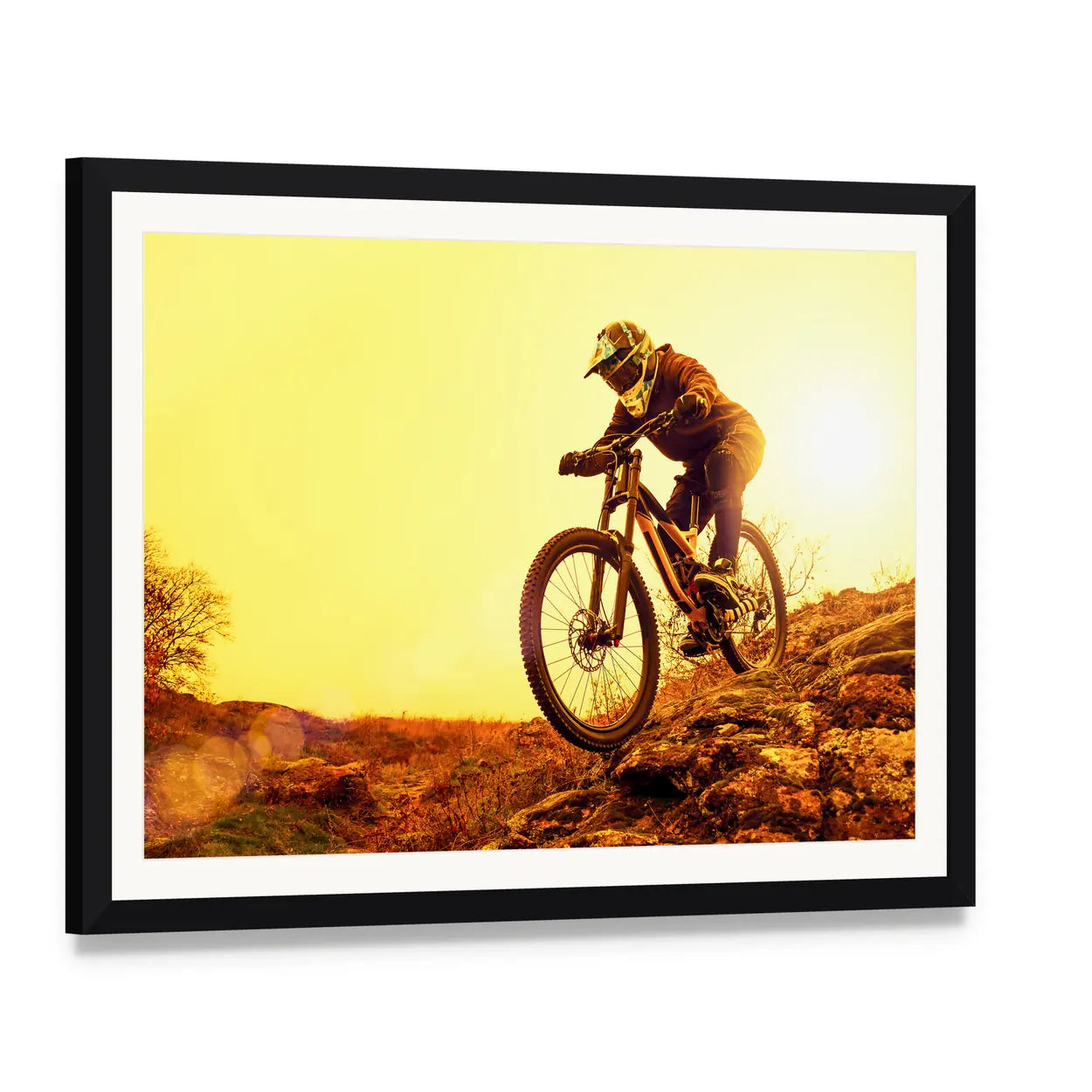 Cyclist Riding Mountain Bike Canvas Wall Art, framed print with white mat and black frame, angled product view