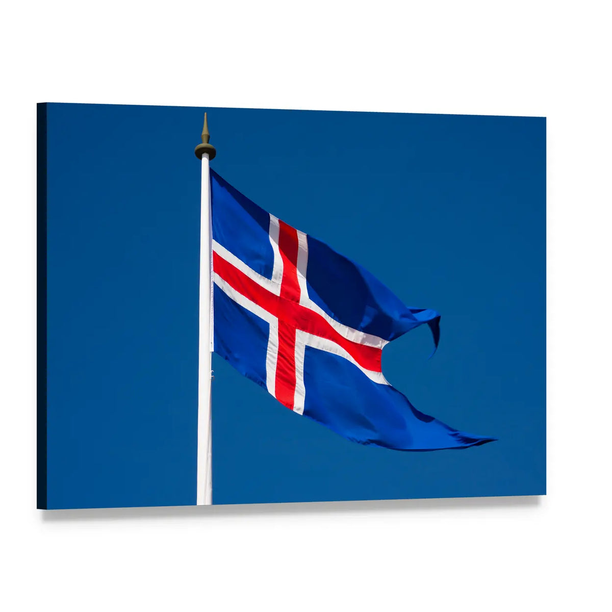 Icelandic Flag Against Blue Sky Canvas Wall Art, single panel gallery wrapped canvas, angled product view