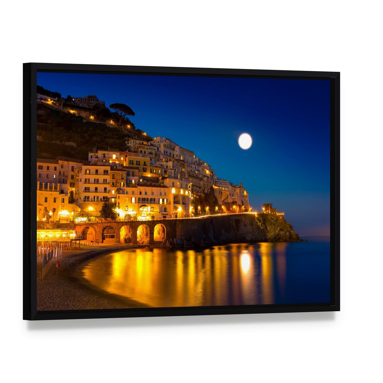 Amalfi Coast Moonlit Village Canvas Wall Art, framed canvas in a black floater frame, angled product view