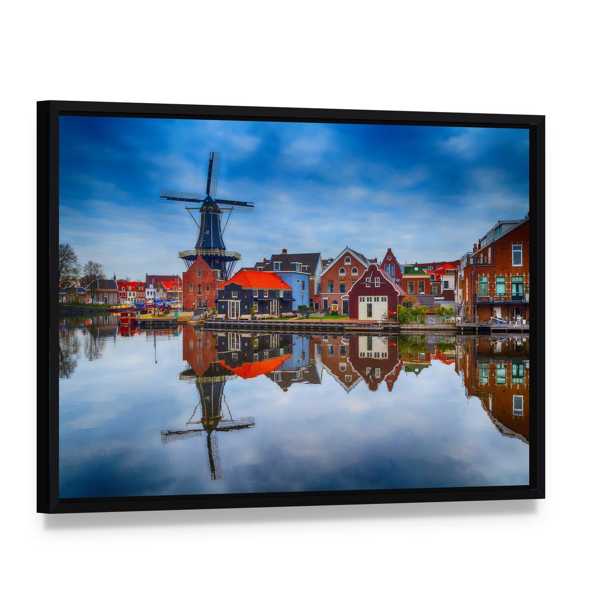 Haarlem Windmill and Colorful Houses Canvas Wall Art, framed canvas in a black floater frame, angled product view