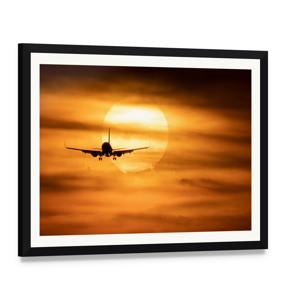 Airplane Silhouette at Sunset Canvas Wall Art, framed print with white mat and black frame, angled product view