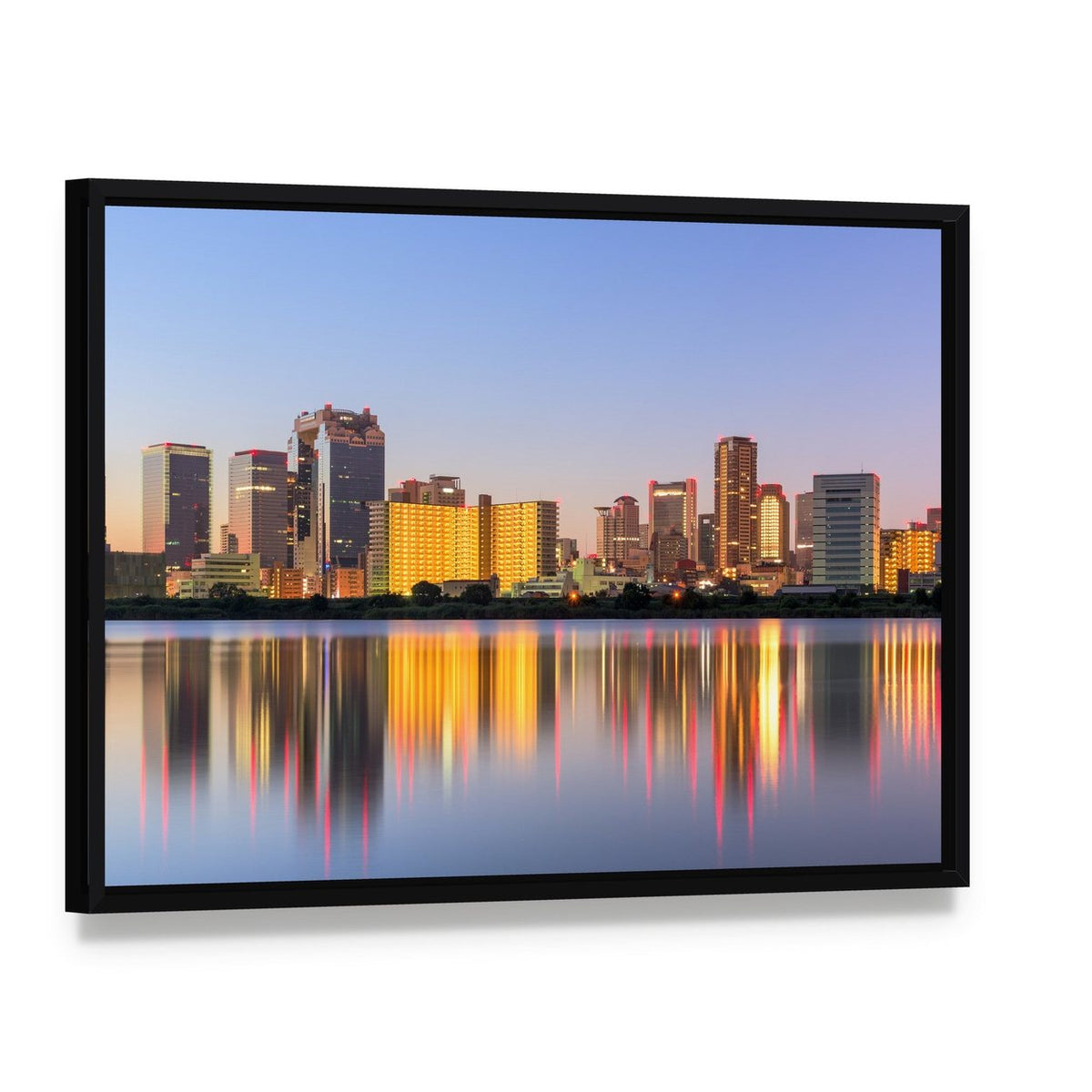 City Skyline at Dusk with Water Reflection Canvas Wall Art, framed canvas in a black floater frame, angled product view