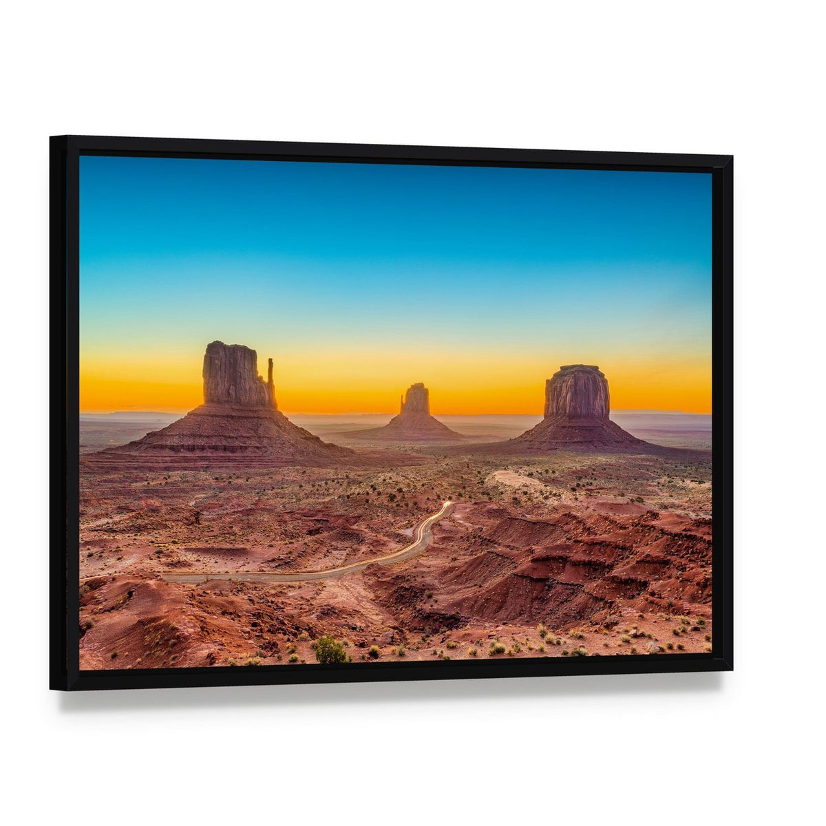Monument Valley at Dawn Canvas Wall Art, framed canvas in a black floater frame, angled product view