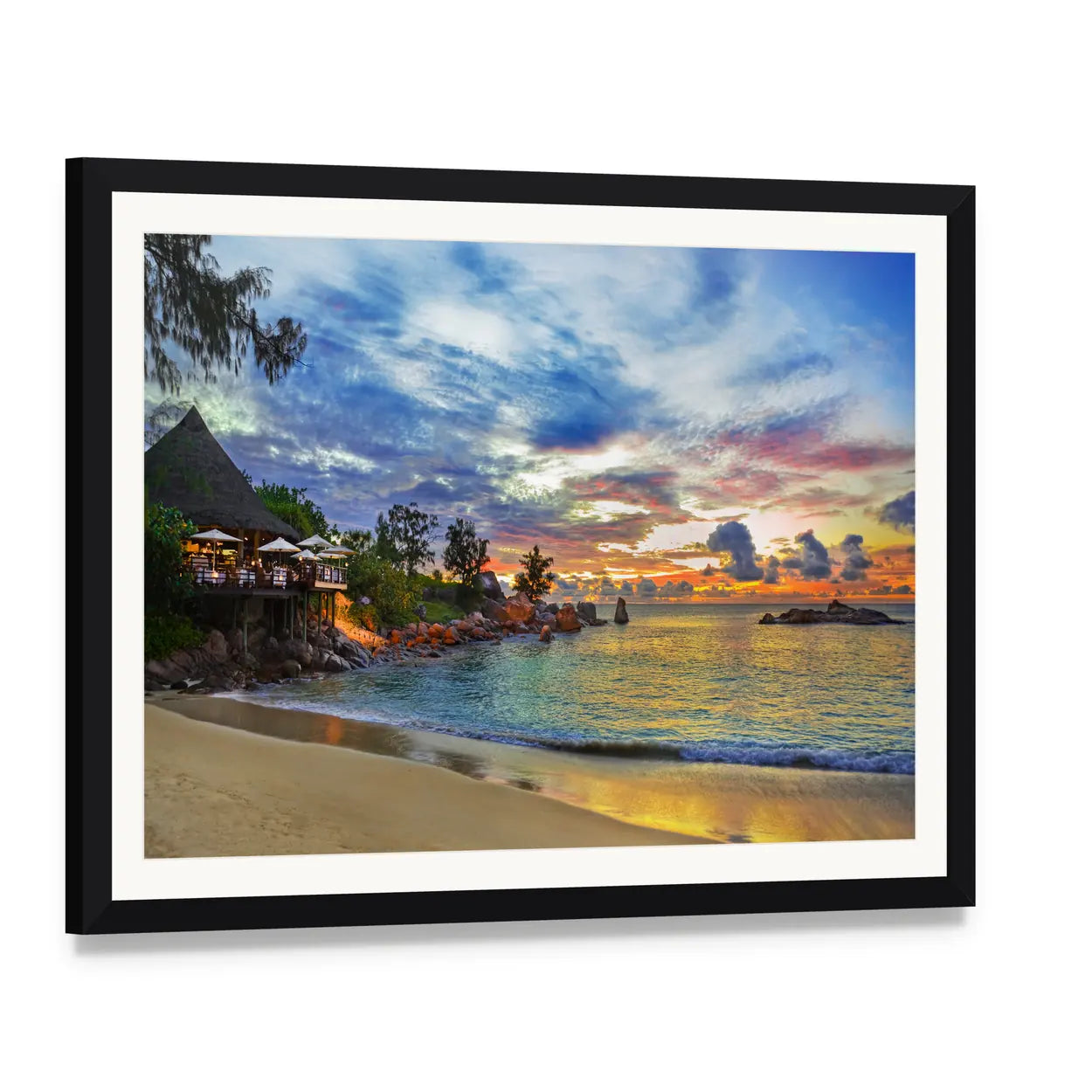 Sunset Cafe on Tropical Beach Canvas Wall Art, framed print with white mat and black frame, angled product view