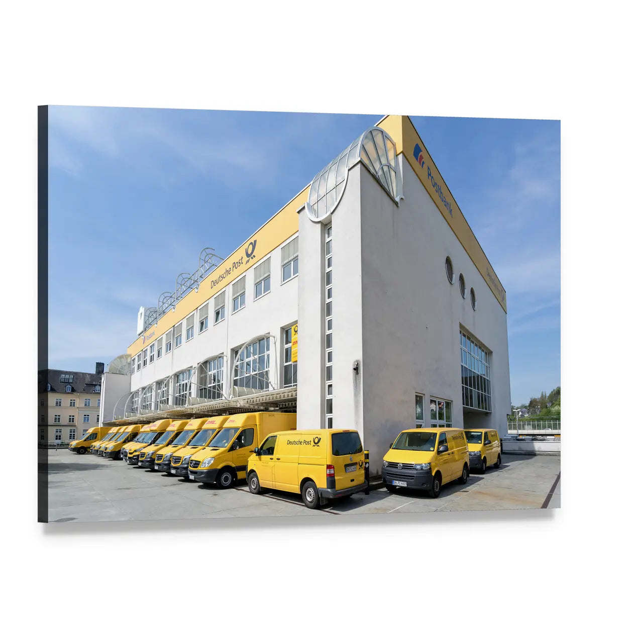 German Logistics Building with Yellow Postal Vans Canvas Wall Art, single panel gallery wrapped canvas, angled product view
