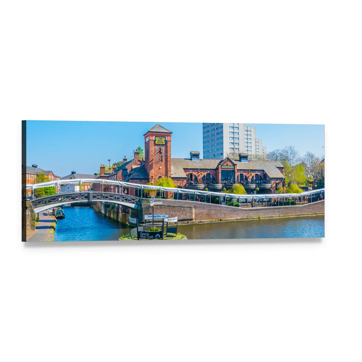 Canal with White Arched Bridge and Clock Tower Panoramic Canvas Wall Art, single panel gallery wrapped canvas, angled product view