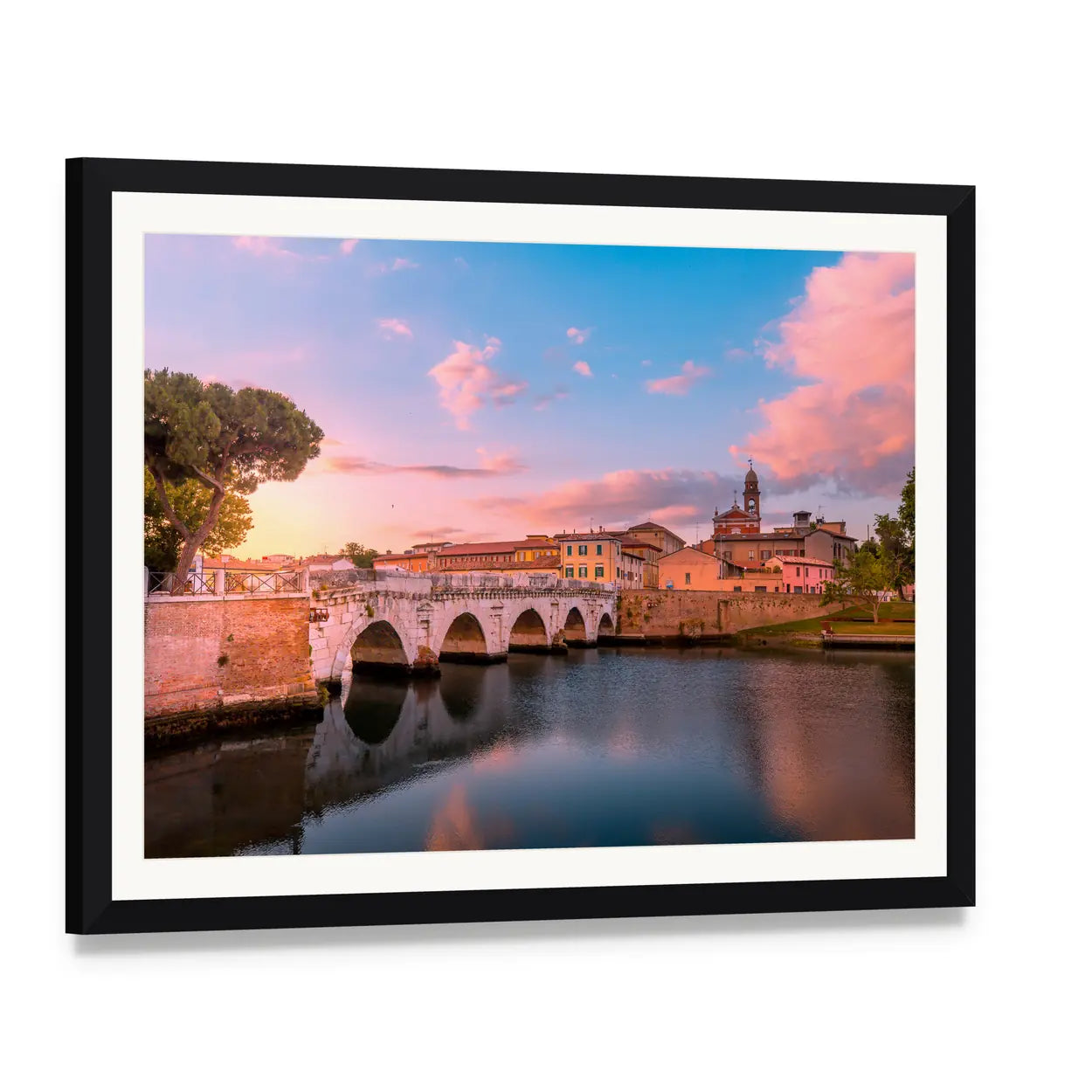 Arched Bridge Reflecting at Sunset Canvas Wall Art, framed print with white mat and black frame, angled product view