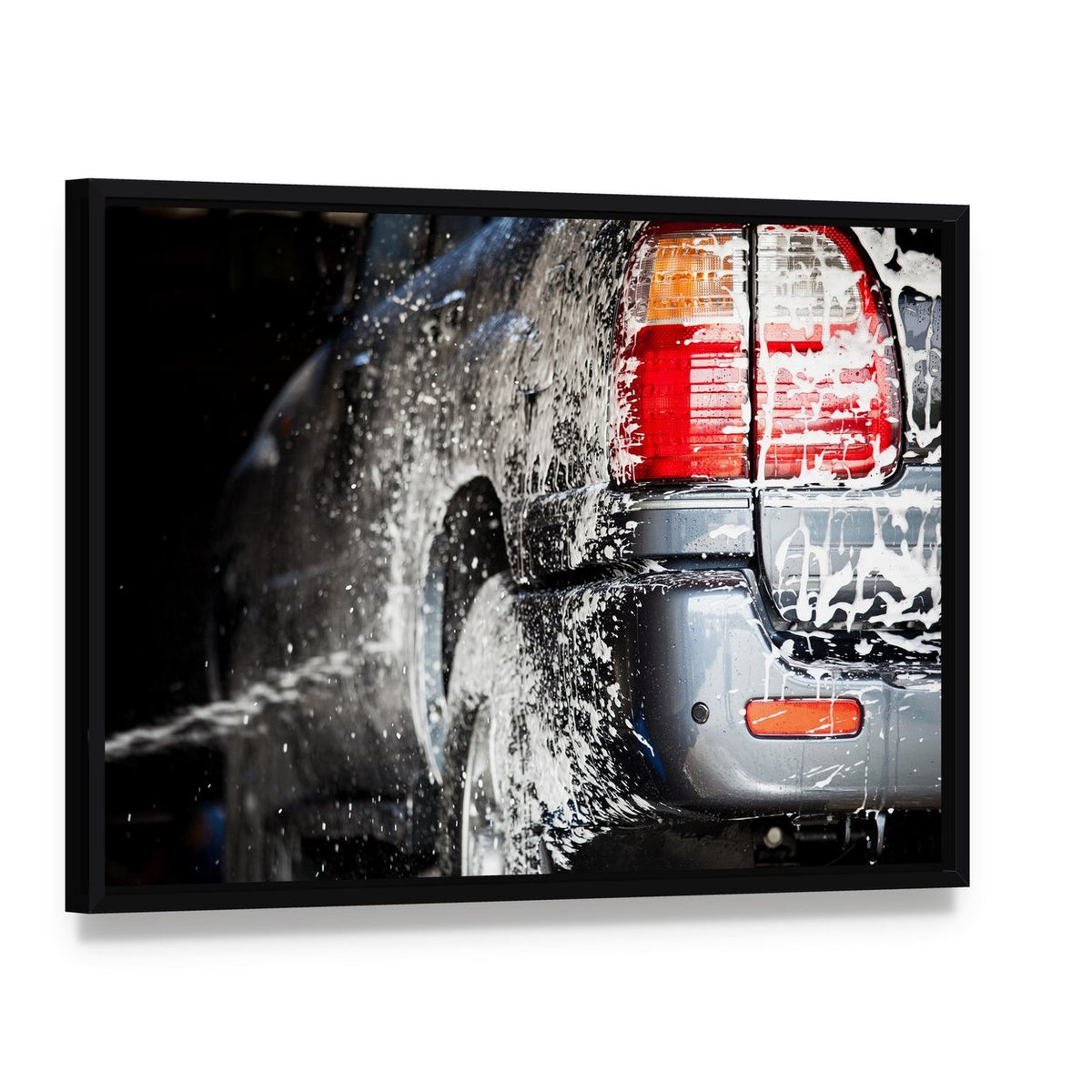 Car in Carwash Canvas Wall Art, framed canvas in a black floater frame, angled product view