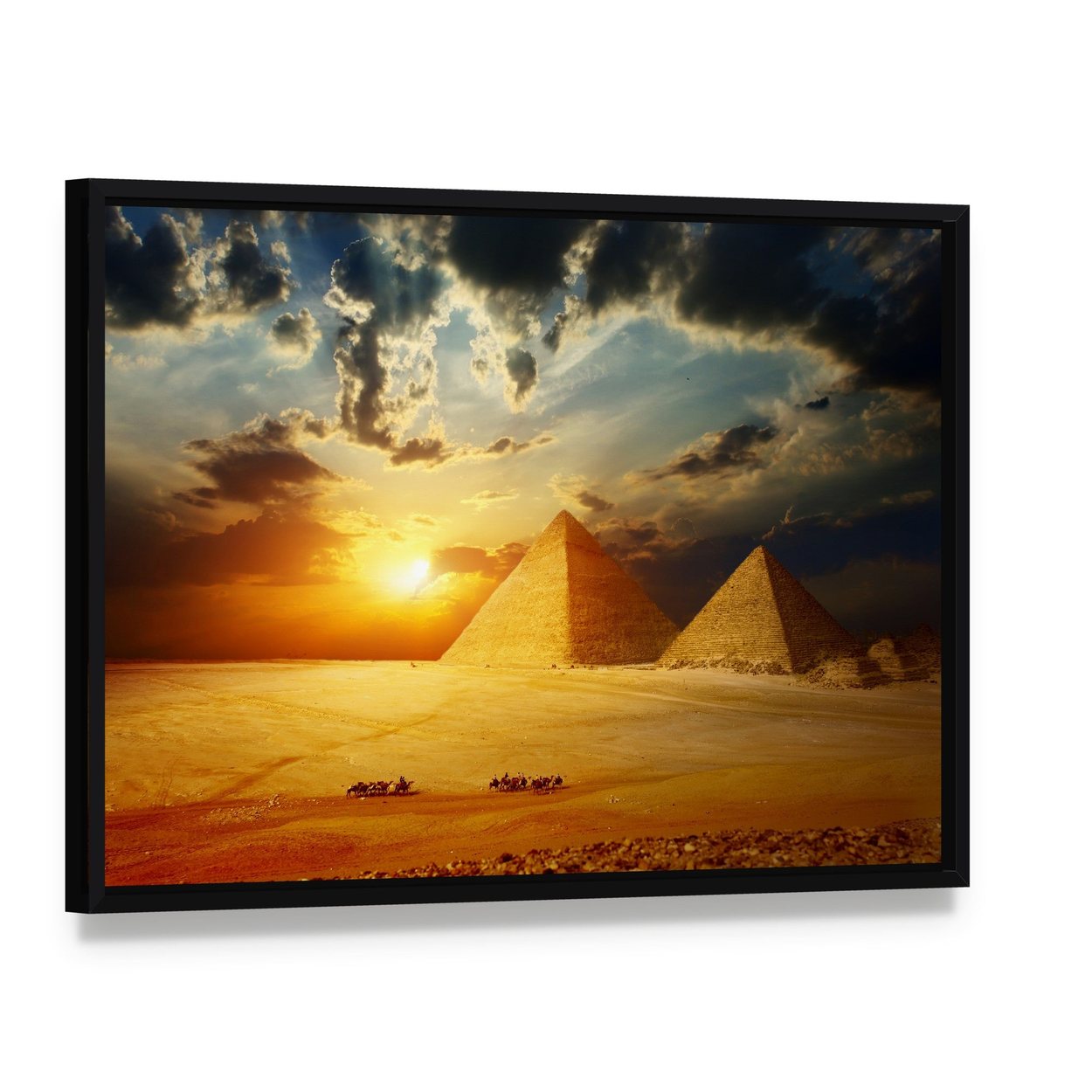 Sunset on Egyptian Pyramids Under Dark Clouds Canvas Wall Art, framed canvas in a black floater frame, angled product view