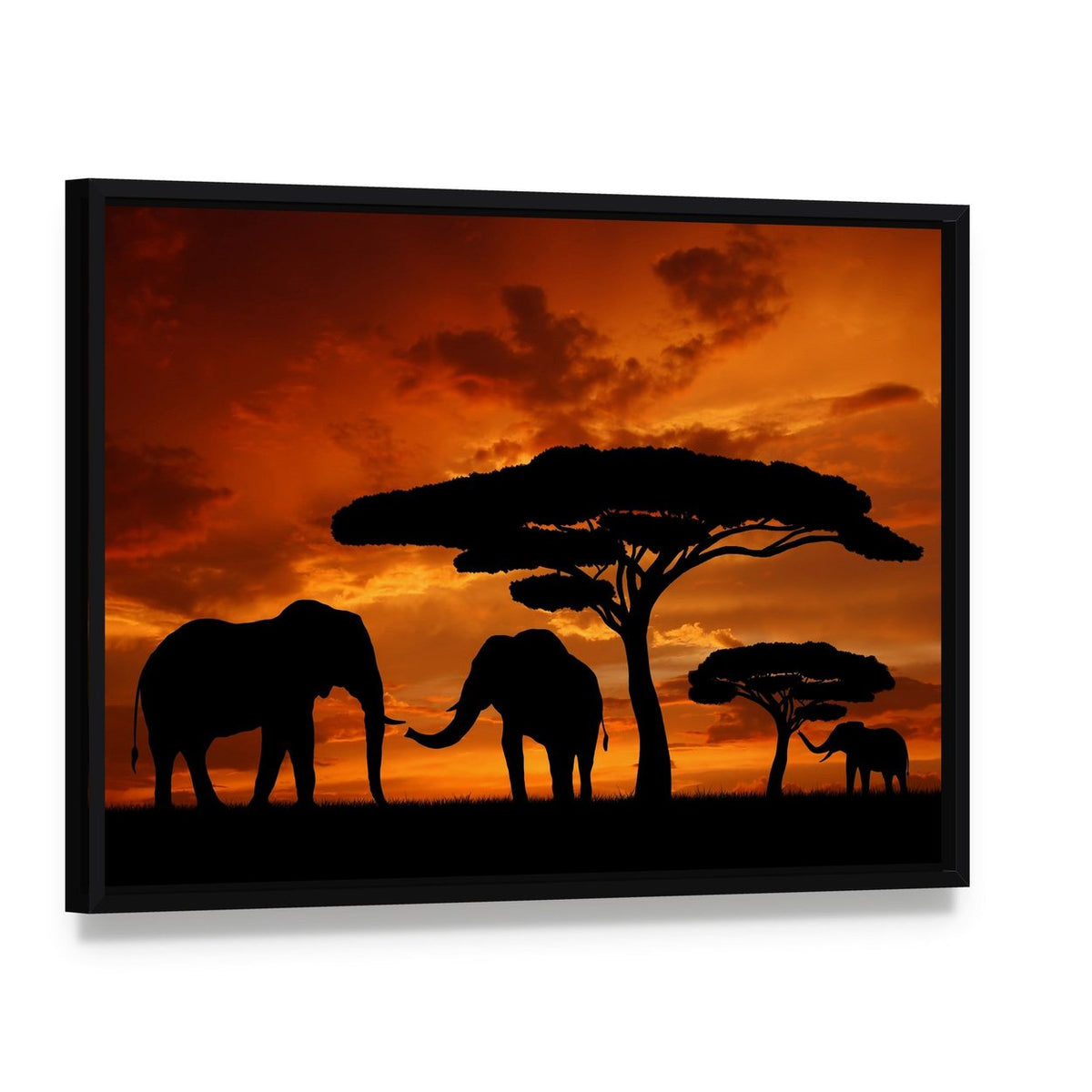 Silhouette of Two Elephants in the Sunset Canvas Wall Art, framed canvas in a black floater frame, angled product view