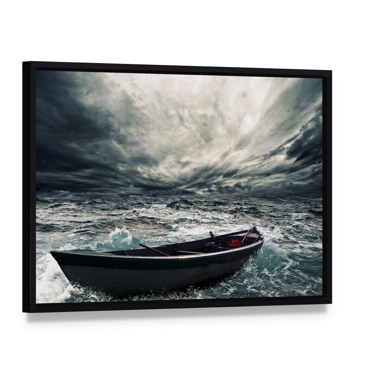 Boat in Stormy Sea Canvas Wall Art, framed canvas in a black floater frame, angled product view