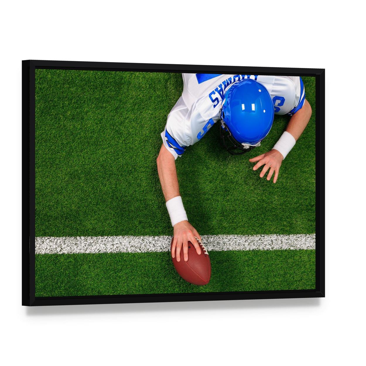 Overhead View of Football Playertouchdown Canvas Wall Art, framed canvas in a black floater frame, angled product view