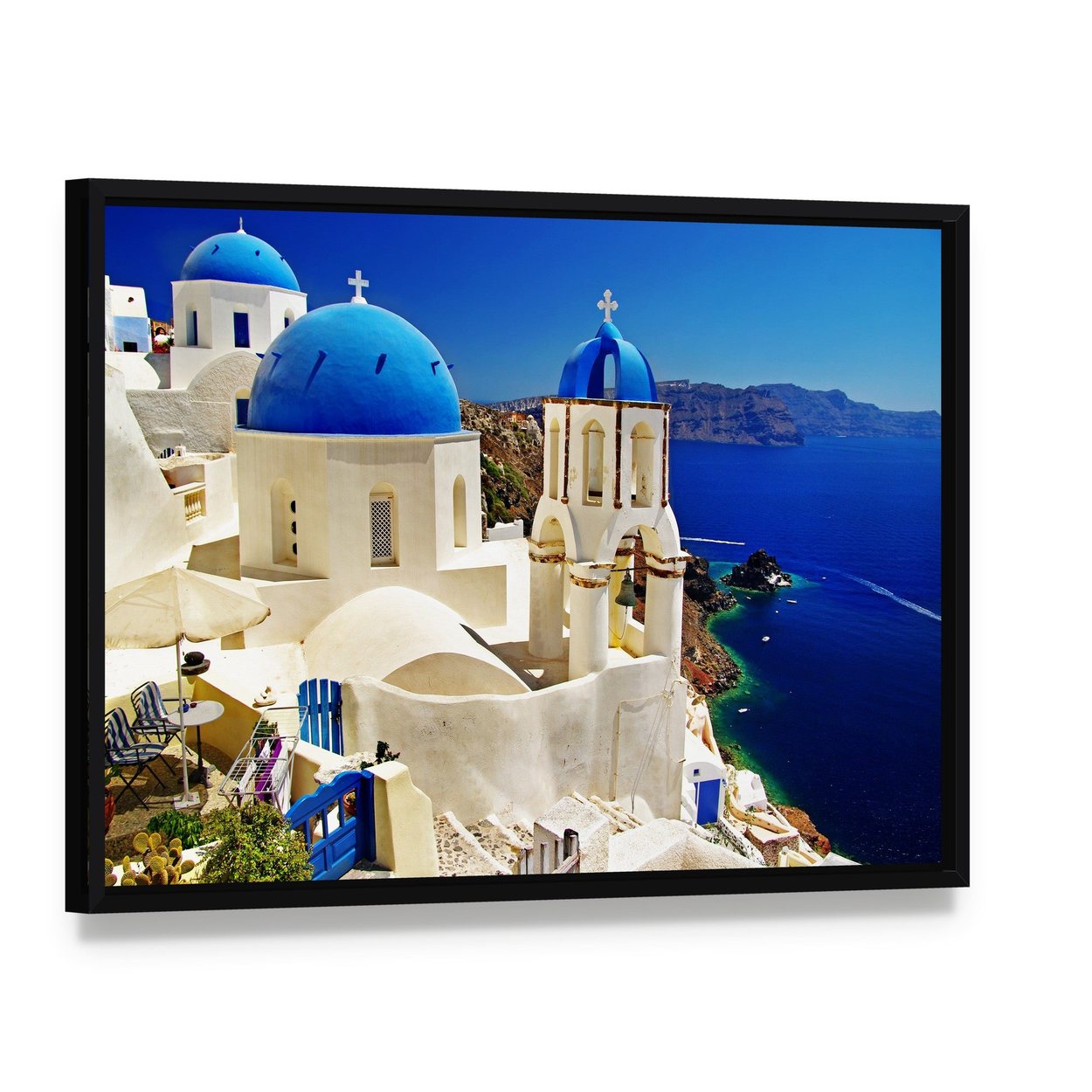 Serene Blue and White Santorini Scene Canvas Wall Art, framed canvas in a black floater frame, angled product view