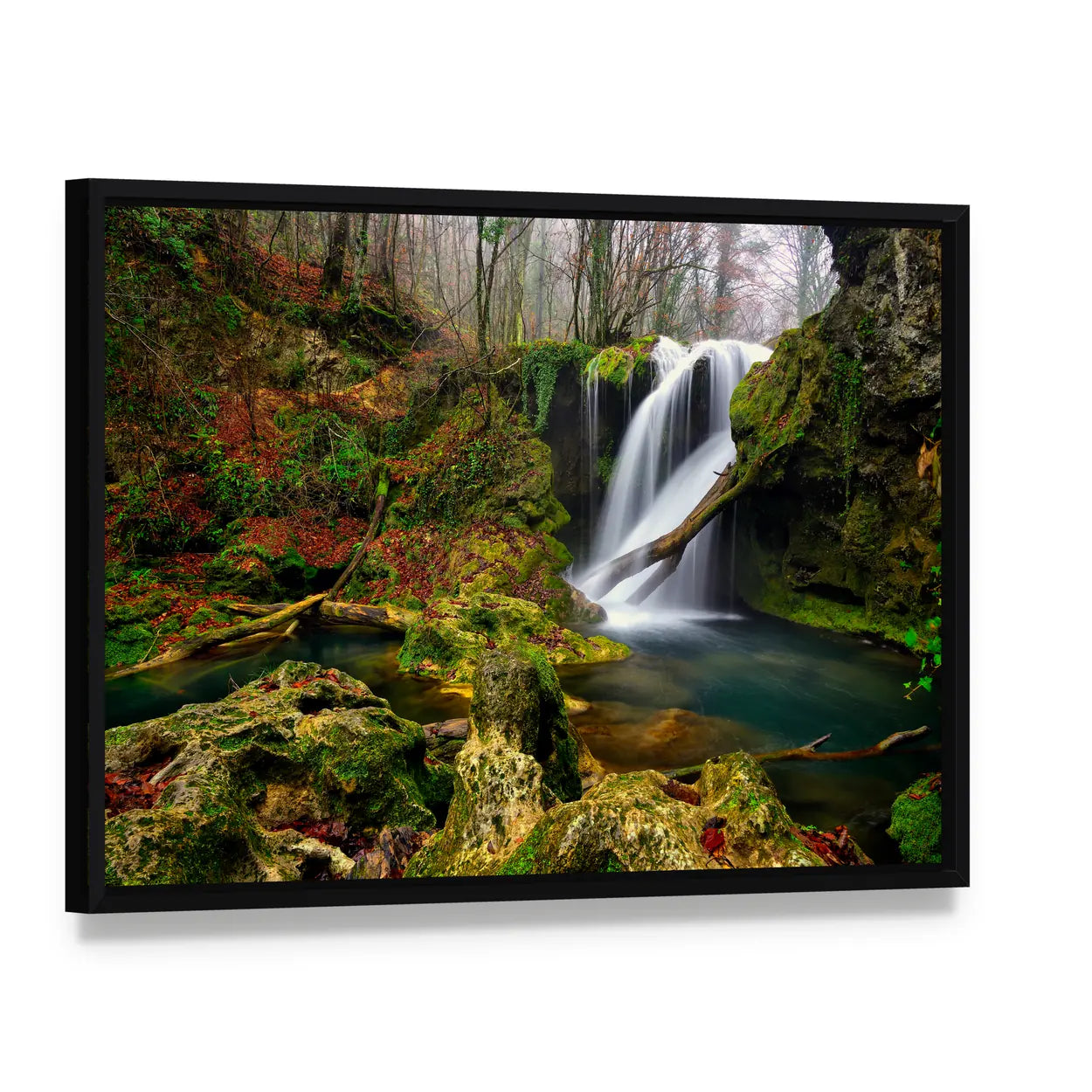 Waterfall In The Forest Canvas Wall Art, framed canvas in a black floater frame, angled product view