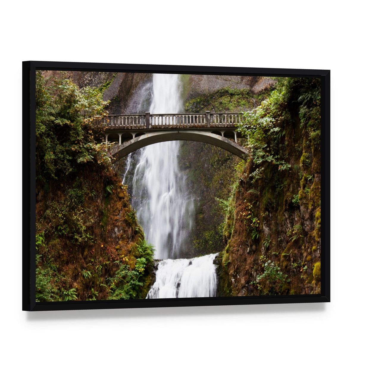 Multnomah Falls Waterfall and Stone Bridge Canvas Wall Art, framed canvas in a black floater frame, angled product view