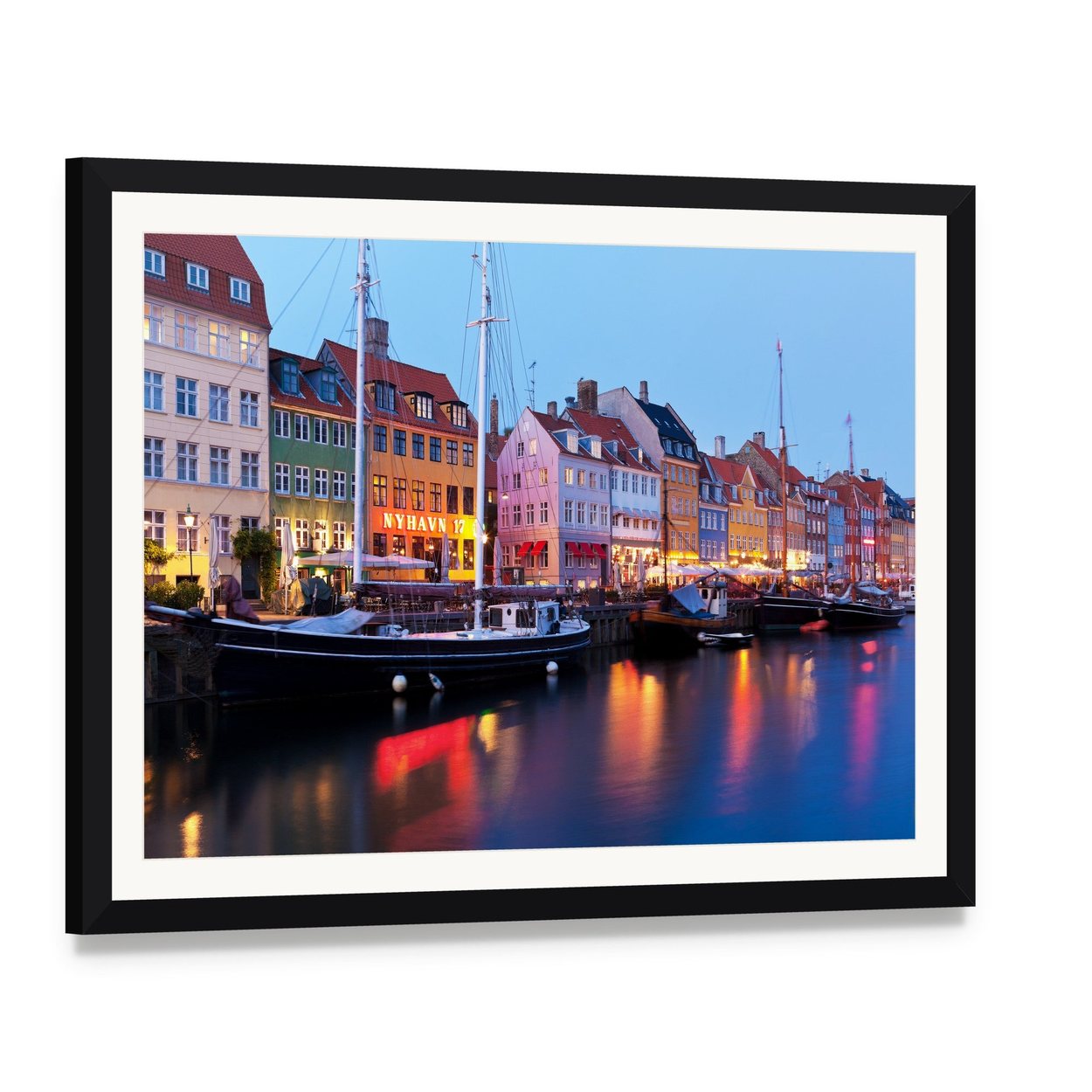 Vibrant Nyhavn Harbor Scene in Copenhagen Canvas Wall Art, framed print with white mat and black frame, angled product view