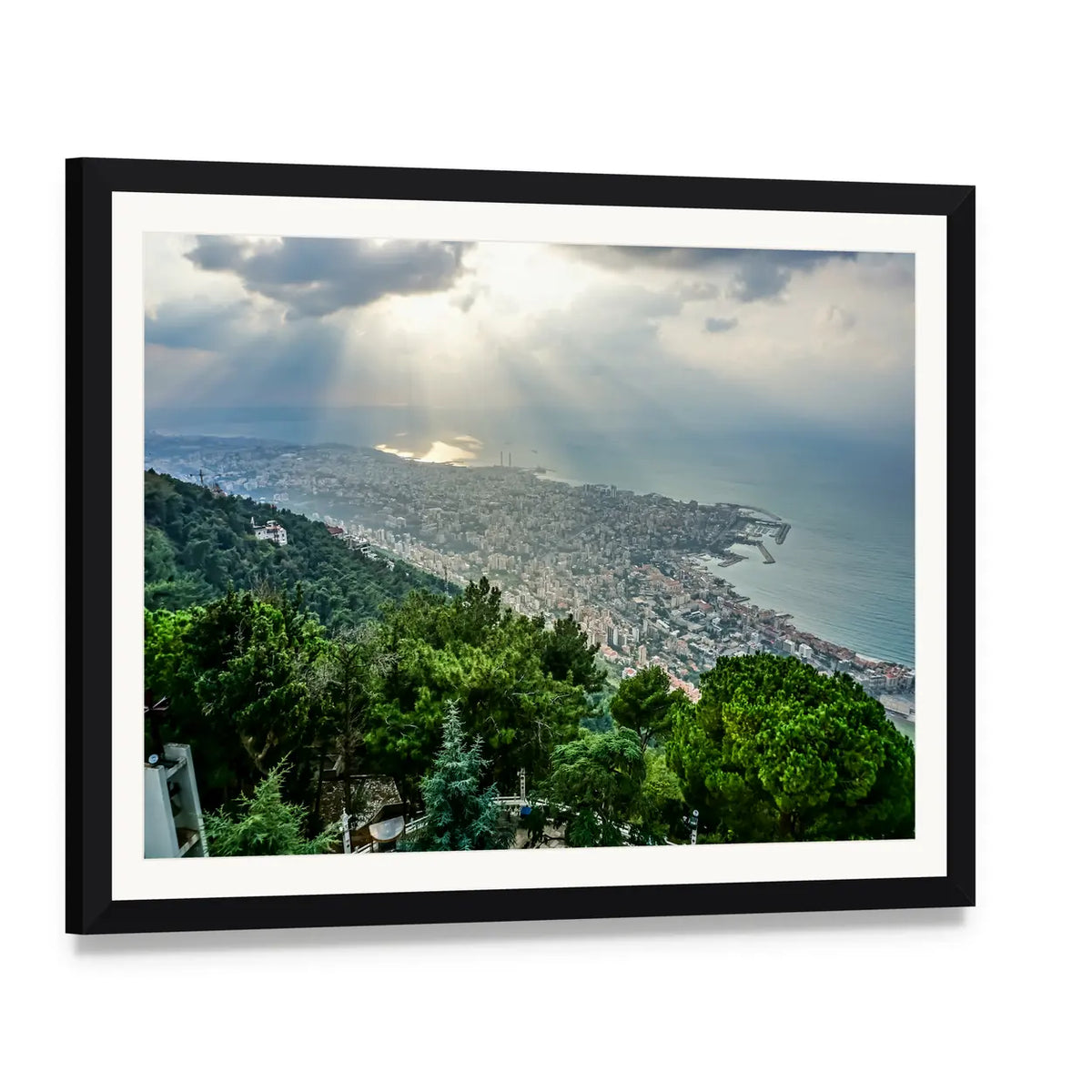 Sunbeams Over Coastal Cityscape Canvas Wall Art, framed print with white mat and black frame, angled product view