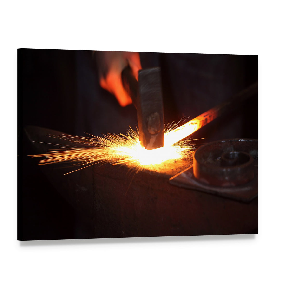 Blacksmith Hands Striking Glowing Metal Canvas Wall Art, single panel gallery wrapped canvas, angled product view