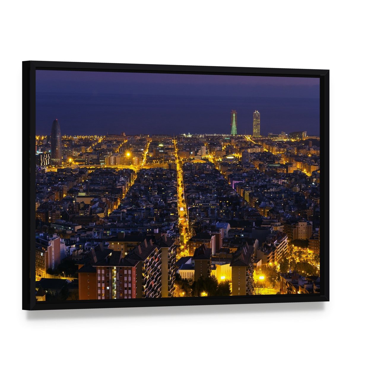 Barcelona Cityscape at Night Canvas Wall Art, framed canvas in a black floater frame, angled product view