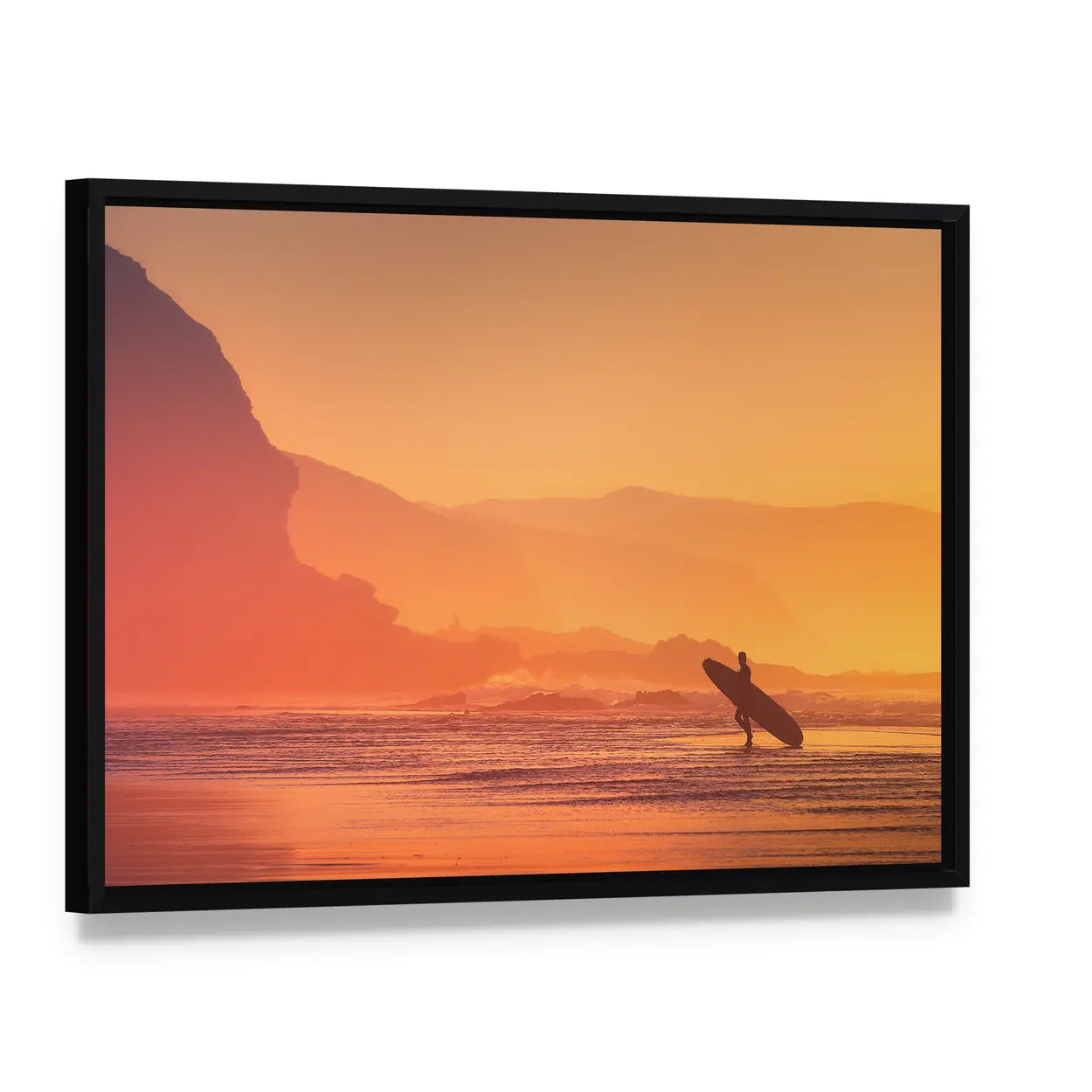 Surfer Silhouette At The Sunset Canvas Wall Art, framed canvas in a black floater frame, angled product view