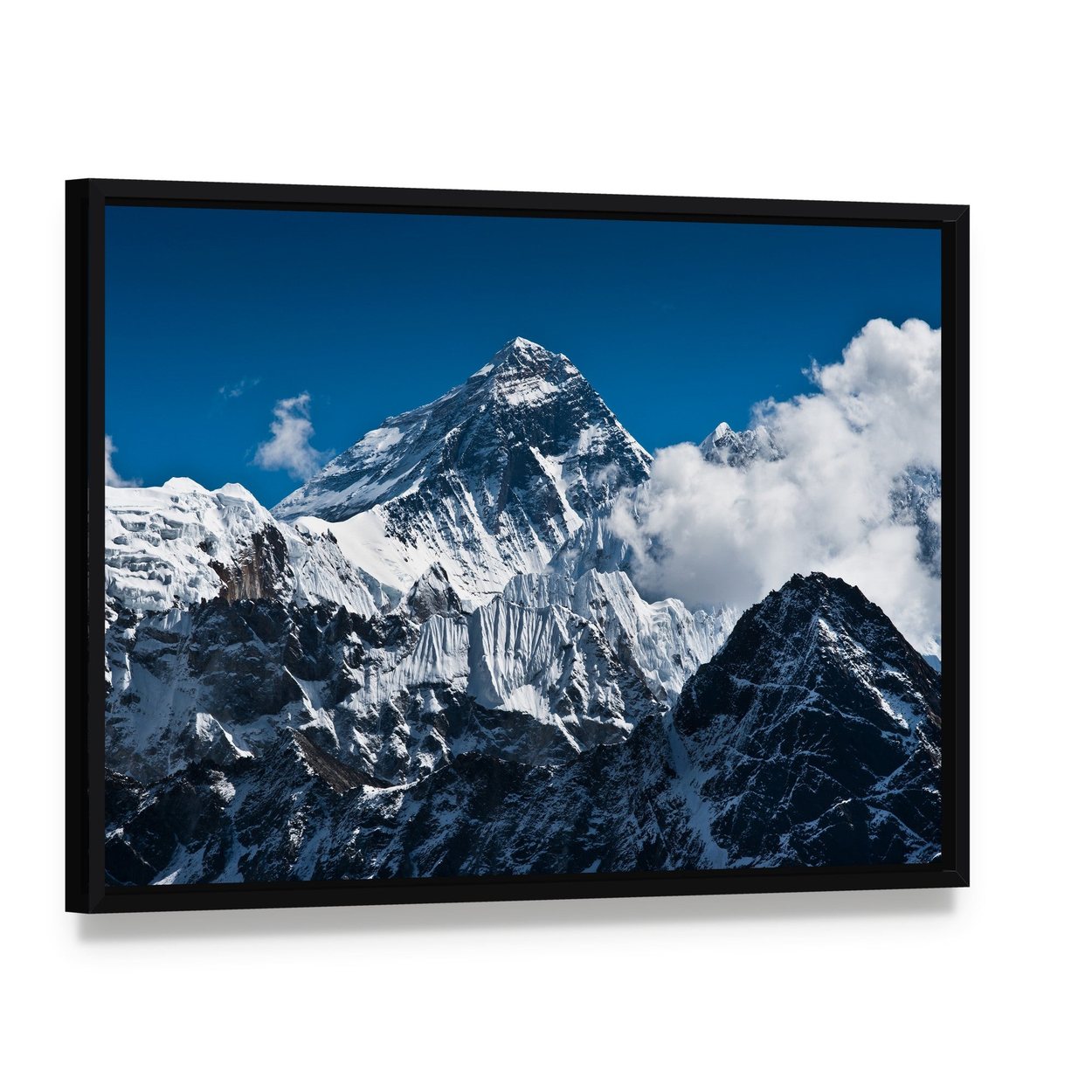 Everest Mountain Peak Canvas Wall Art, framed canvas in a black floater frame, angled product view
