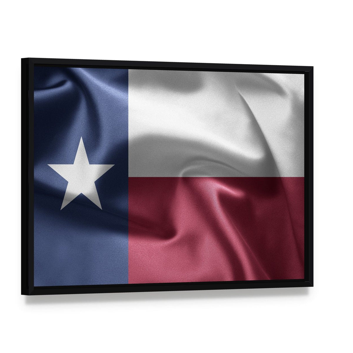 Texas Flag with Diagonal Fold and Fabric Texture Canvas Wall Art, framed canvas in a black floater frame, angled product view