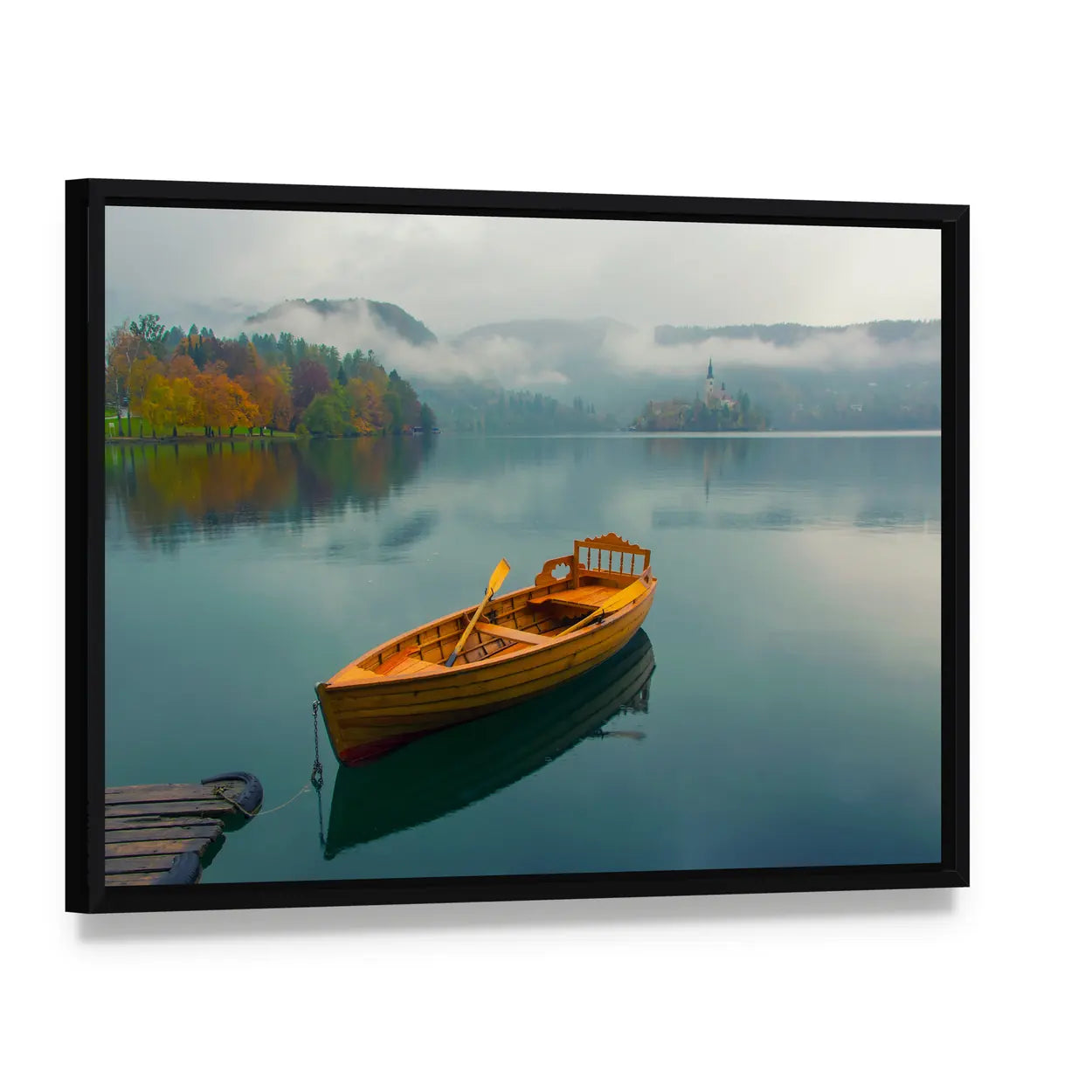 Lonely Boat on Lake Bled Canvas Wall Art, framed canvas in a black floater frame, angled product view